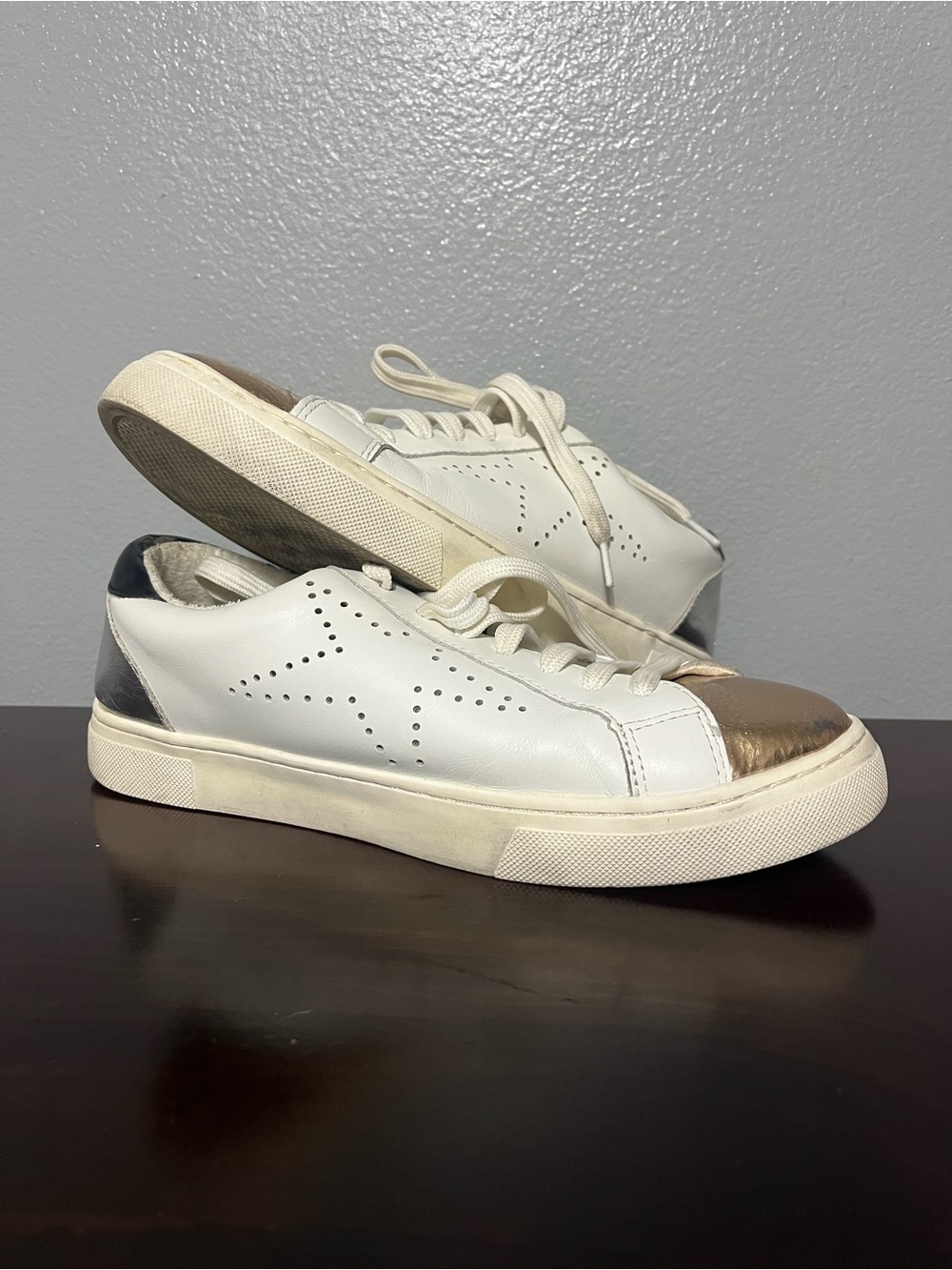 Steve Madden White Leather Sneakers with Metallic Gold Toe and Black Heel